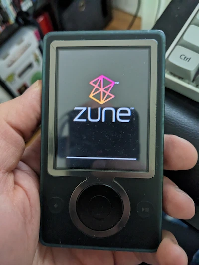 classic Zune 30GB, first edition in black, loading up